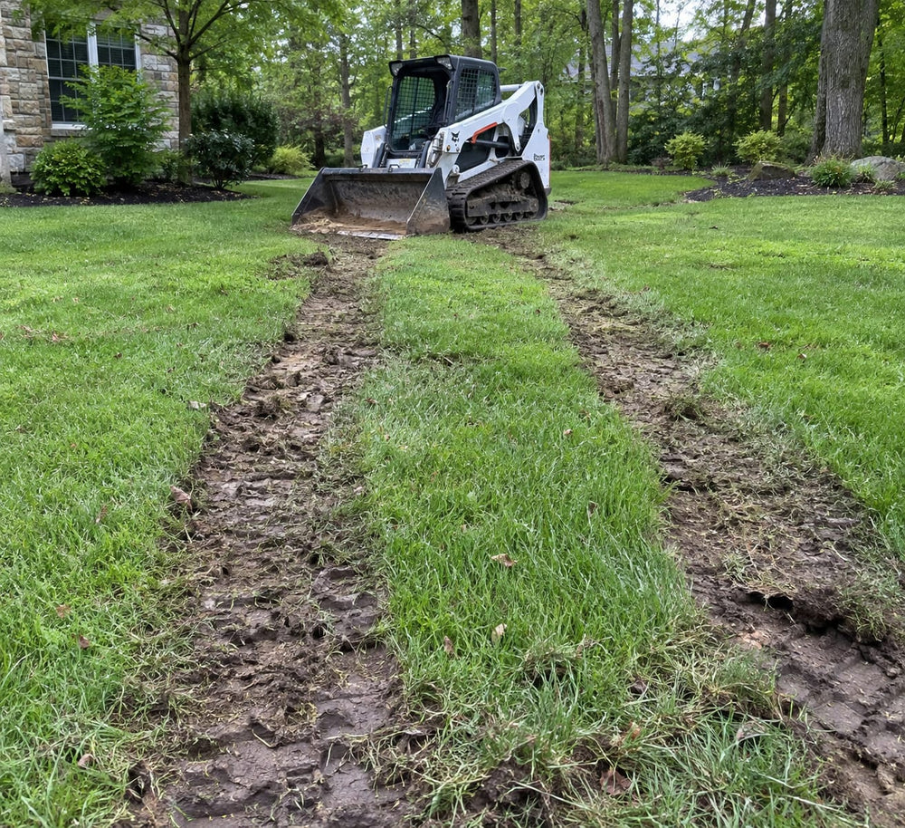 Illustration: lawn rutted by a skid steer without ground protection